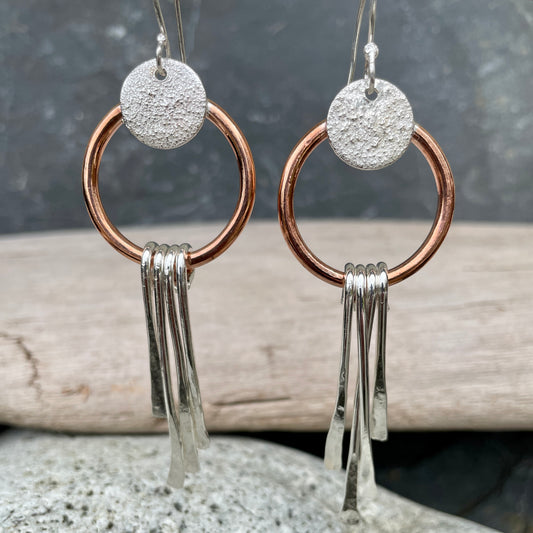 silver and copper dangly earrings